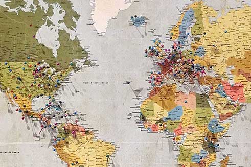 map of the world with pins marking places